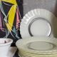 Eight Duralex dessert plates in 60s painted glass