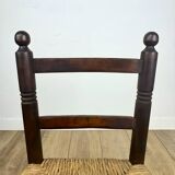 Pair of old wooden and straw children's chairs.