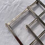 Stretch trivets in silver metal, geometric shapes