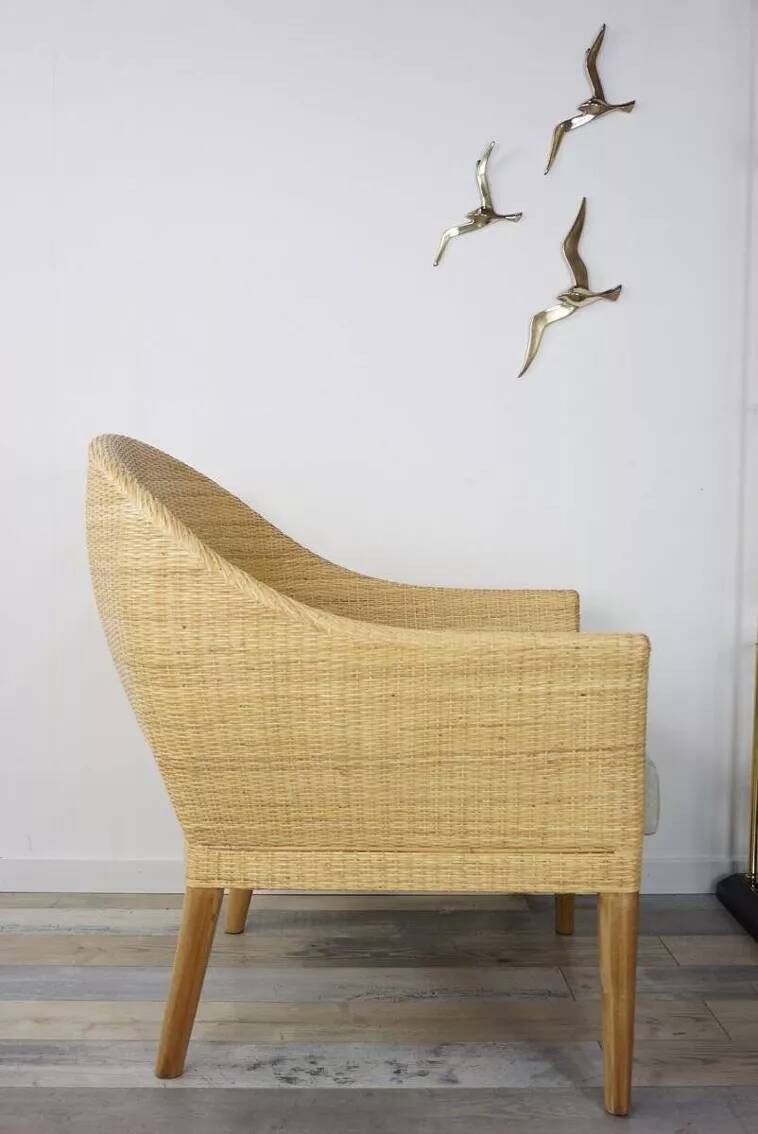 Pair of teak and rattan armchairs