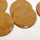 Set of 12 Mother of Pearl coasters with brass edging.