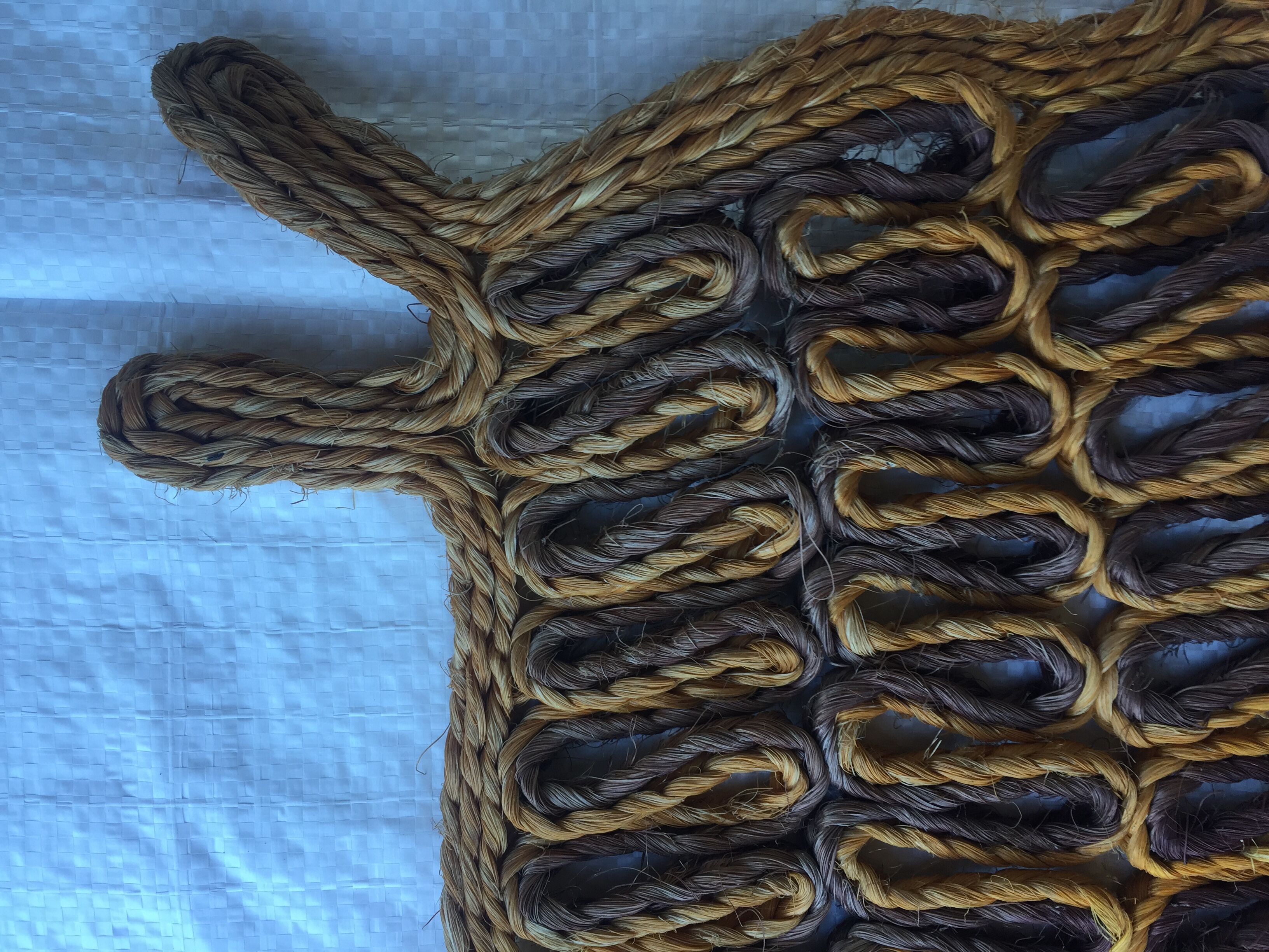 Trio of vintage rope animals table mats