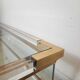 Coffee table with sliding shelf in lucite, brass and glass, Hollywood Regency