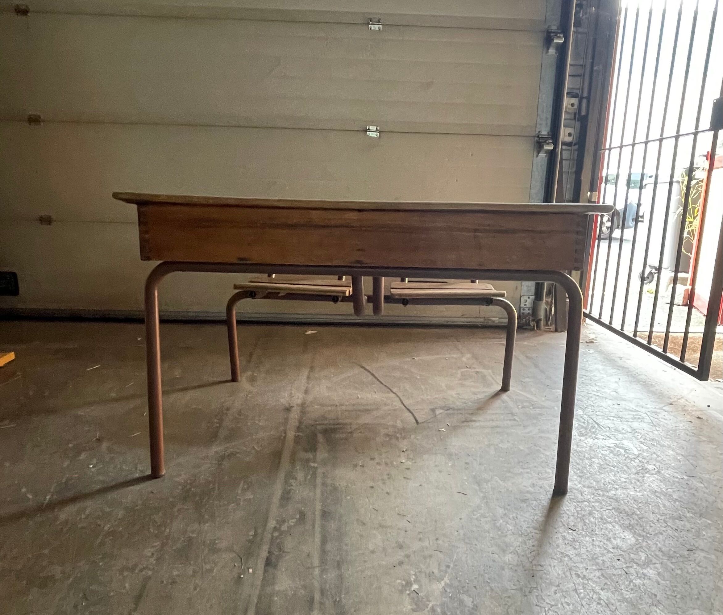 Double wooden desk and brown metal legs