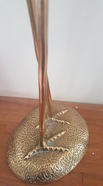 Pair of birds couple of brass herons