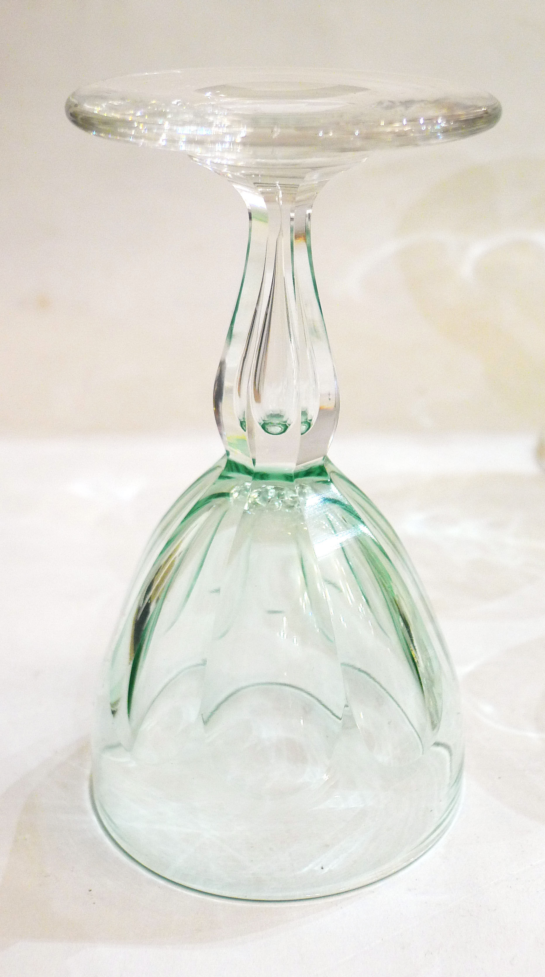 Set of nine glasses on foot in cut glass