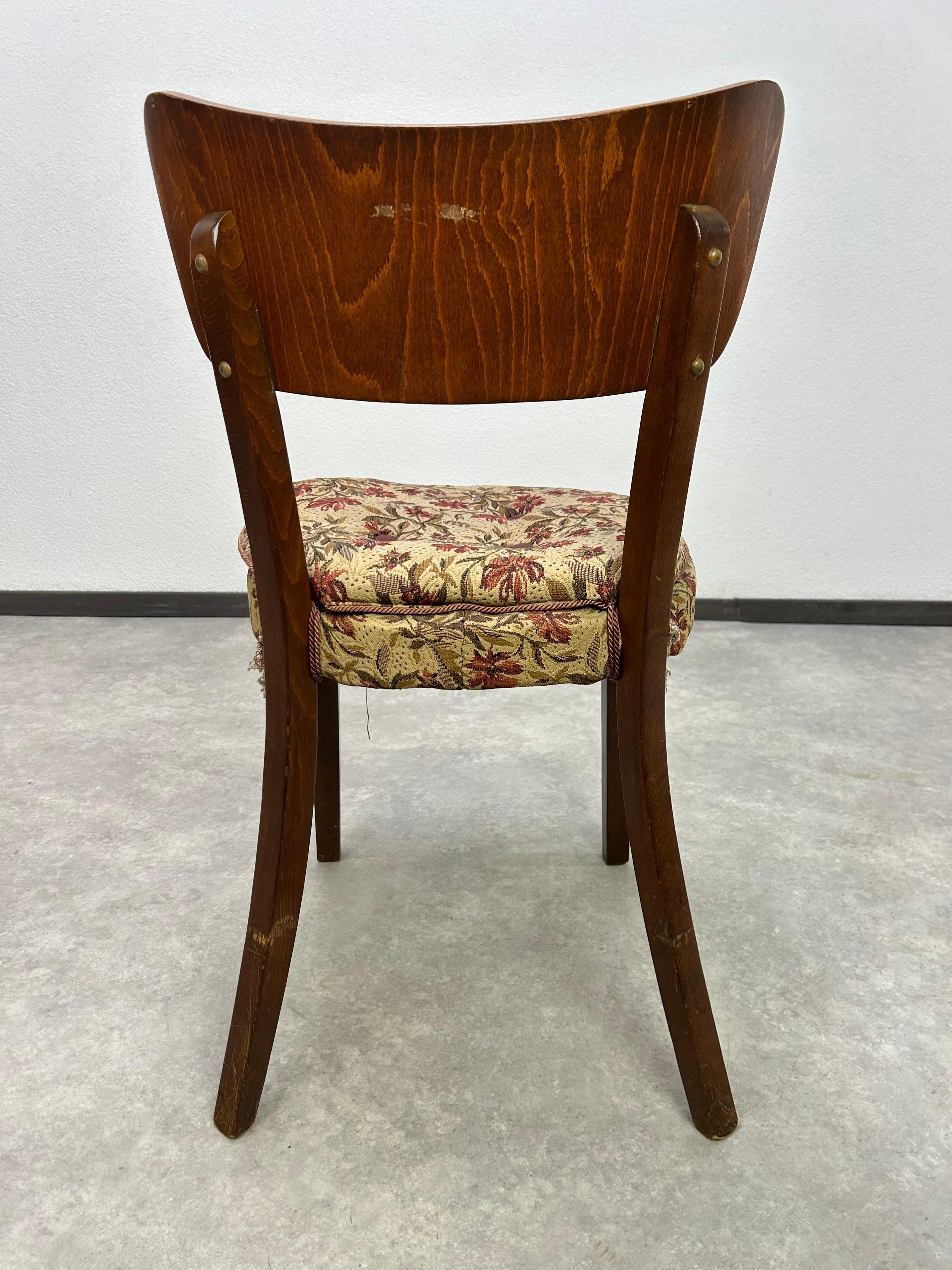 Set of 4 dining chairs by Tatra