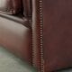 Cowhide Chesterfield armchair in a classic English style
