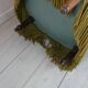 Toad armchair with green fringes
