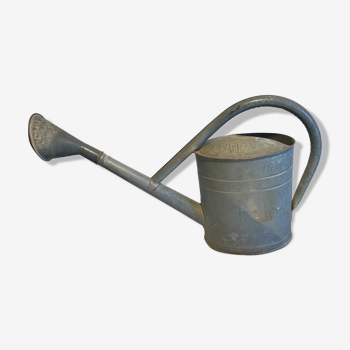 Ancient zinc watering can