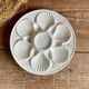 4 assiettes à huîtres en barbotine blanche