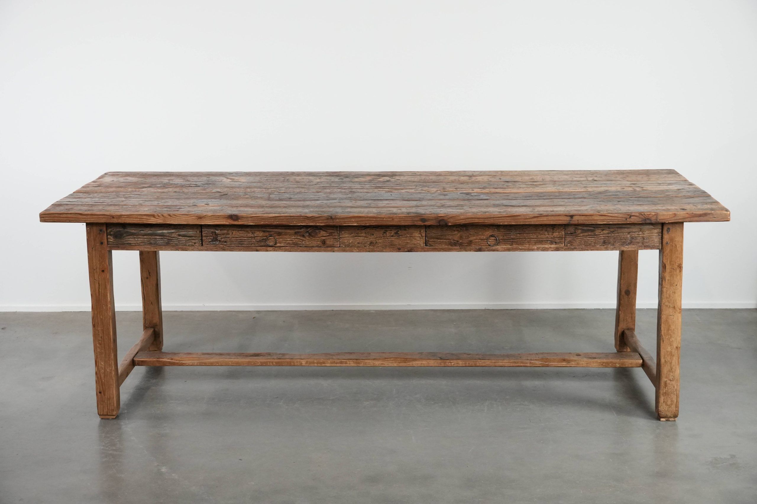 Magnificent and robust antique farmhouse dining table made of pine wood