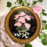 Oval frame domed glass curved roses
