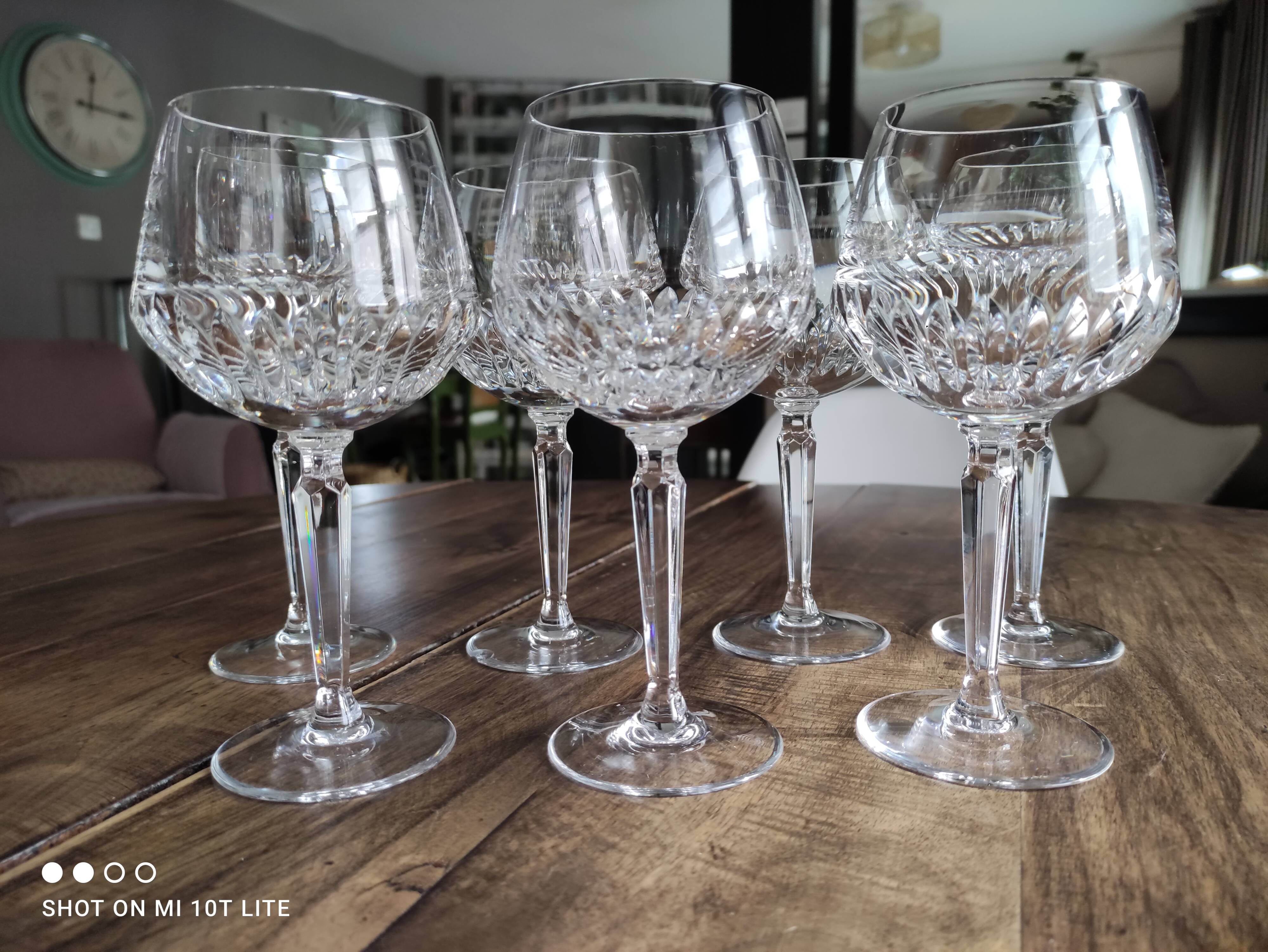 Set of 7 cut crystal wine glasses