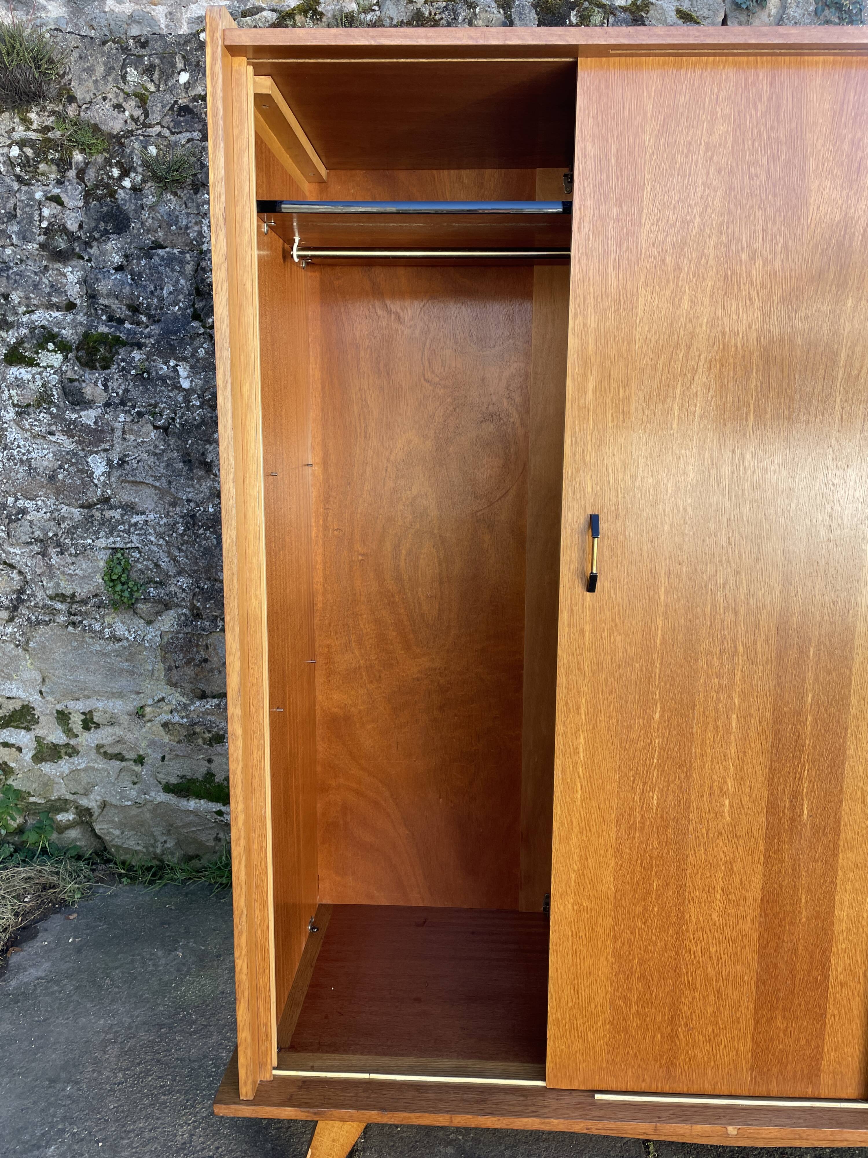 Light oak sliding door wardrobe, 1960