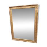 17th century Italian style gilded mirror in carved wood.