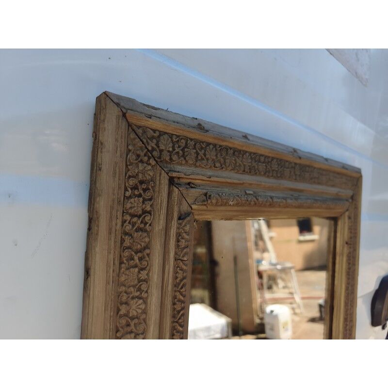 Wood and gilded stucco mirror, 19th century
