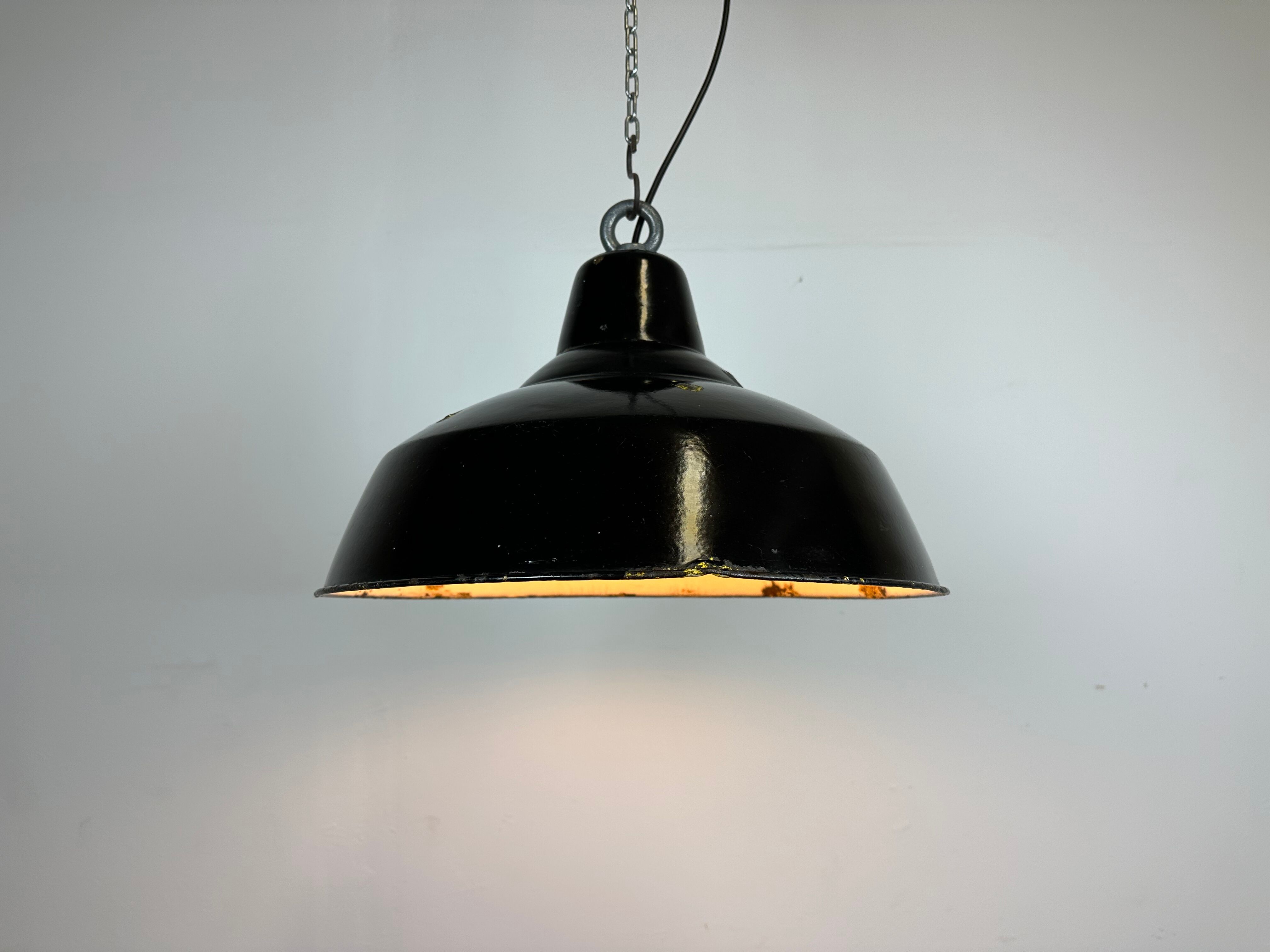 Industrial black enamel factory lamp with iron top, 1960s