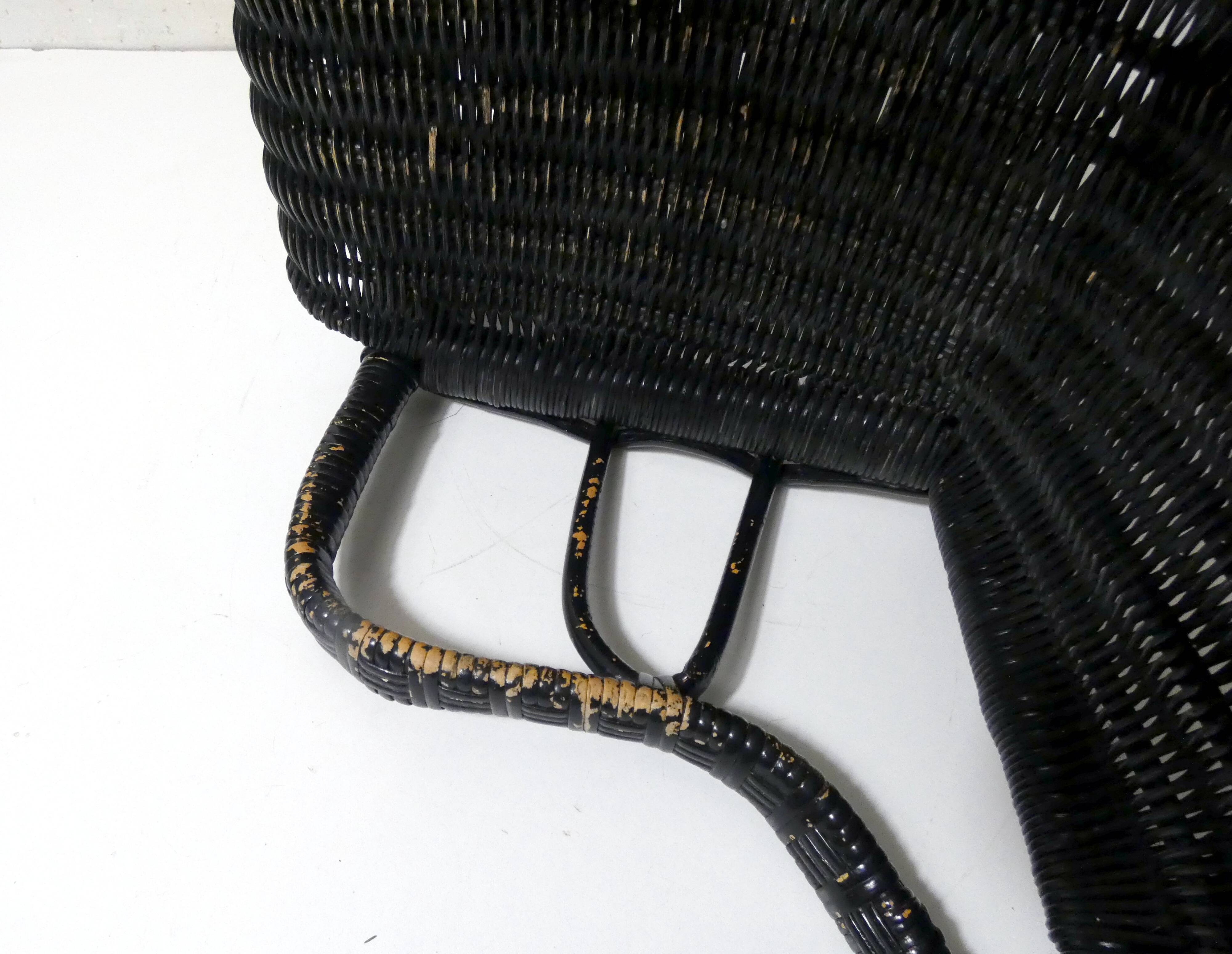 Vintage children's size rattan armchair