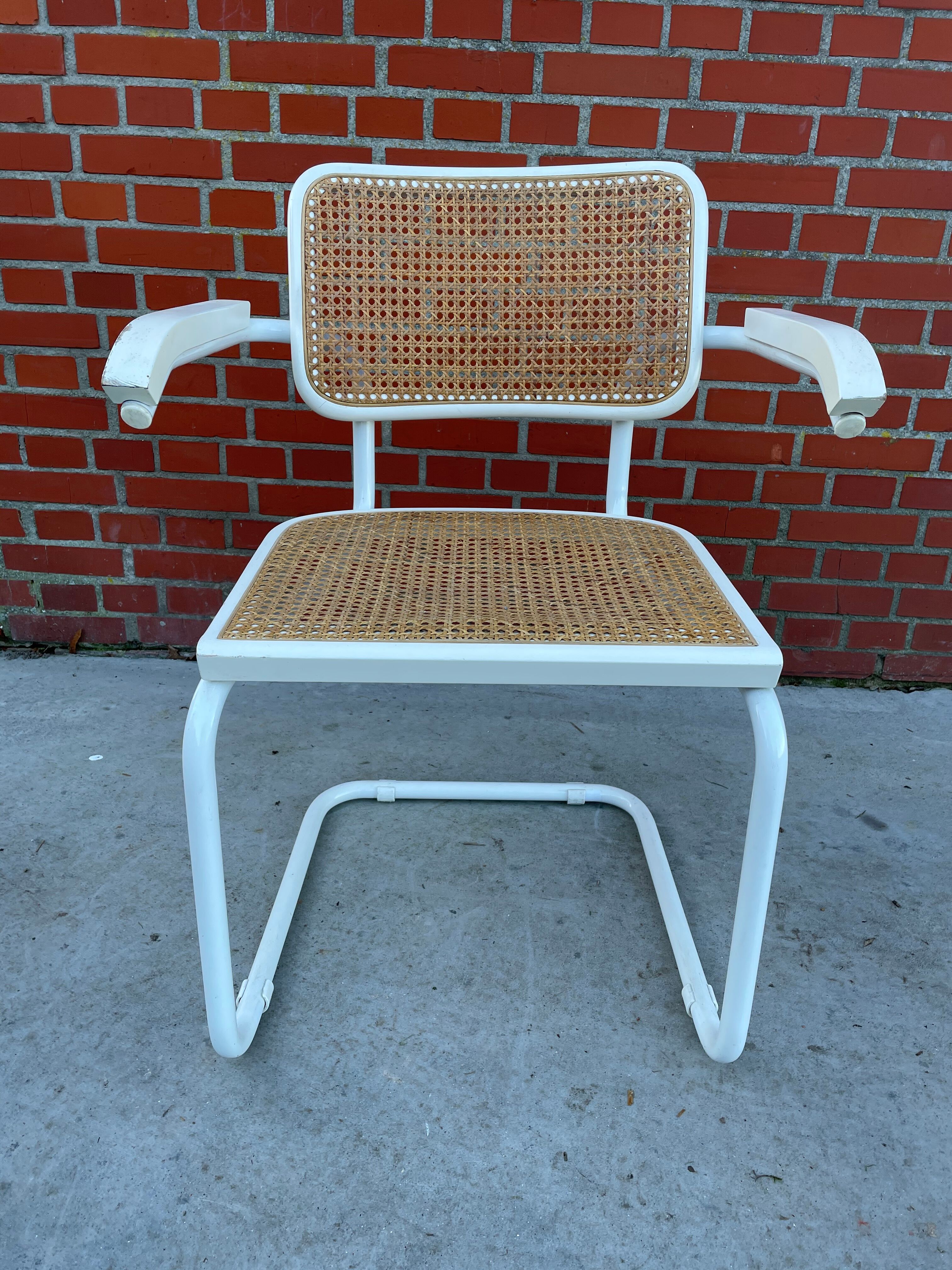 Cesca Chair model with armrest in white