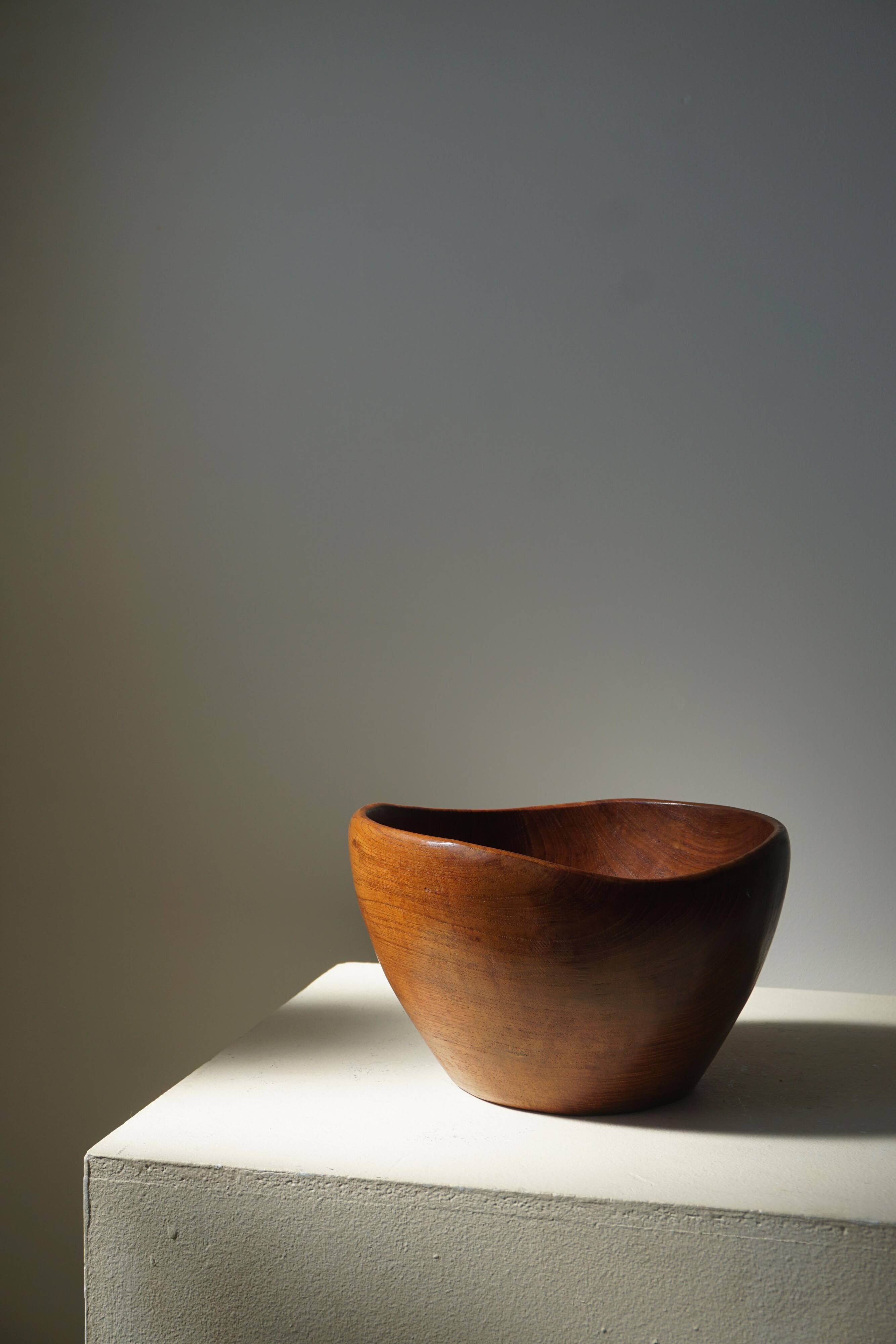 Danish sculptural bowl in teak from the mid-century, handcrafted in the 1960s.