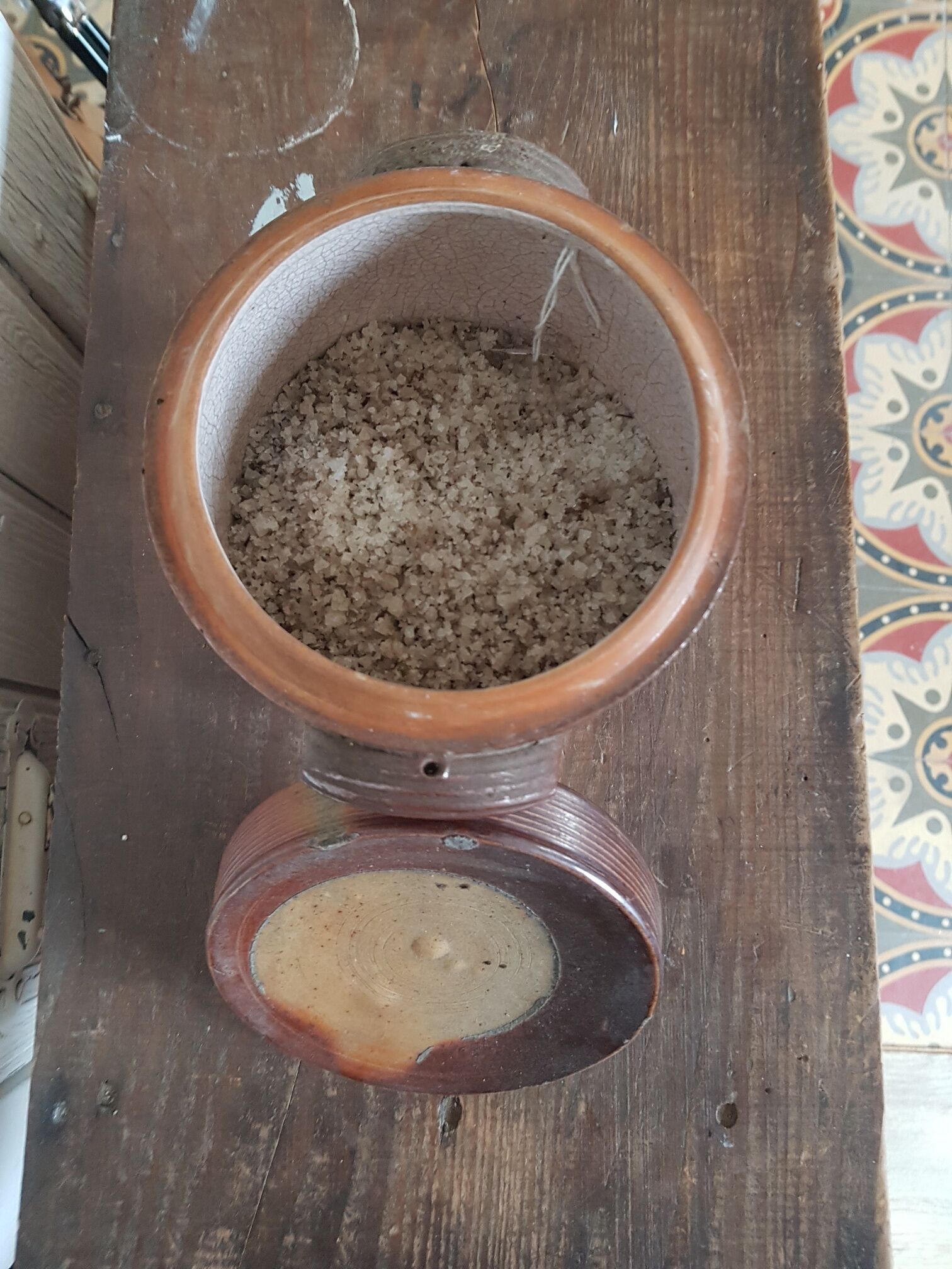 Old sandstone pot with lid