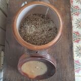 Old sandstone pot with lid