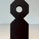 Pair of Minimalist Modernist Wrought Iron Chenets with Torch Holders in Nut Design