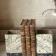 Paire de serre-livres en marbre Art déco