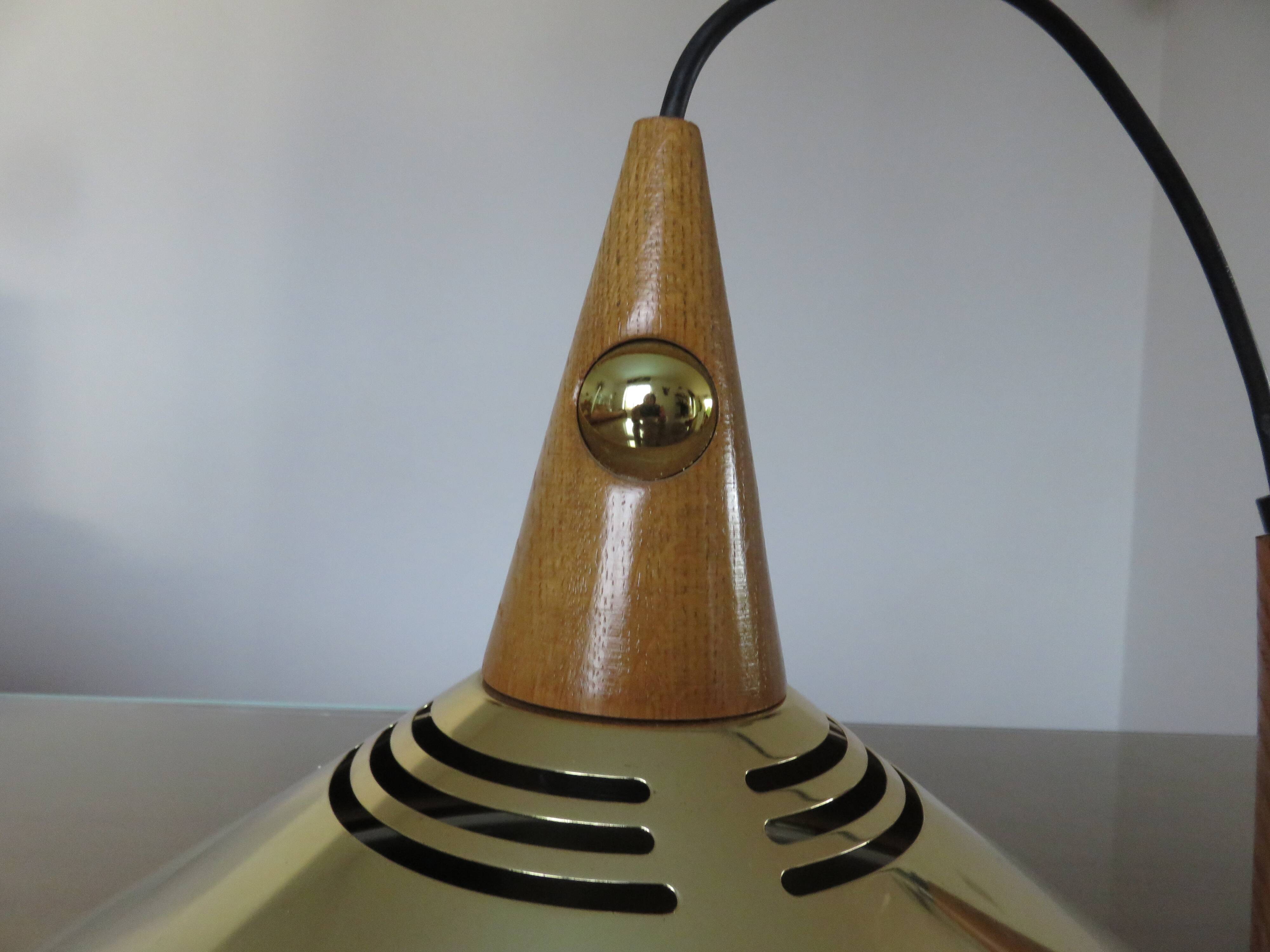 Scandinavian teak and gold metal pendant light from the 70s