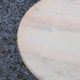 Round neoclassical coffee table with a marble top and golden metal base.