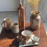 Large antique stoneware bottle with a small cork stopper