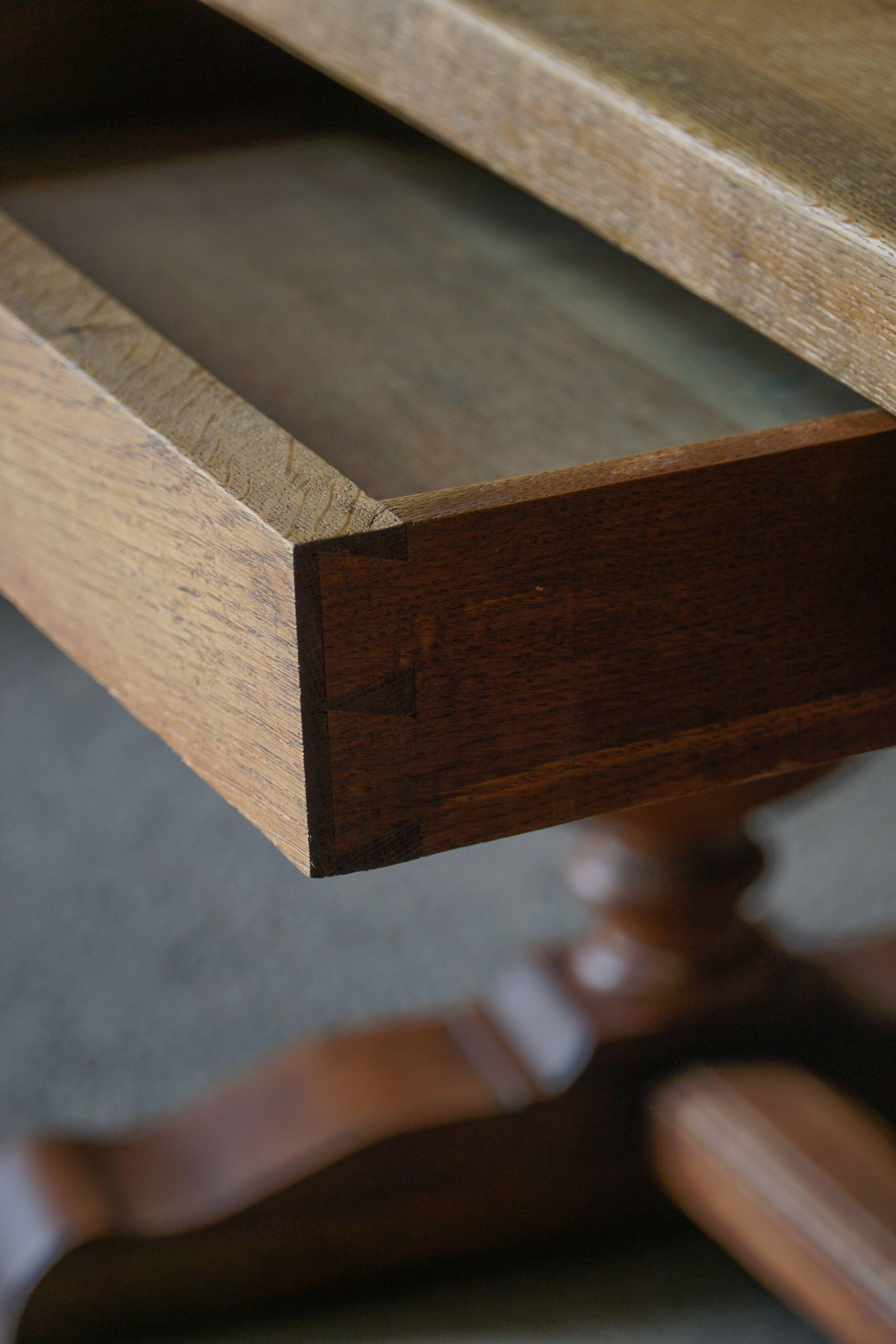 Baroque writing desk from the 1920s in solid oak, by a Danish cabinetmaker.