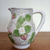 Barbotine pitcher with pastel flower decoration