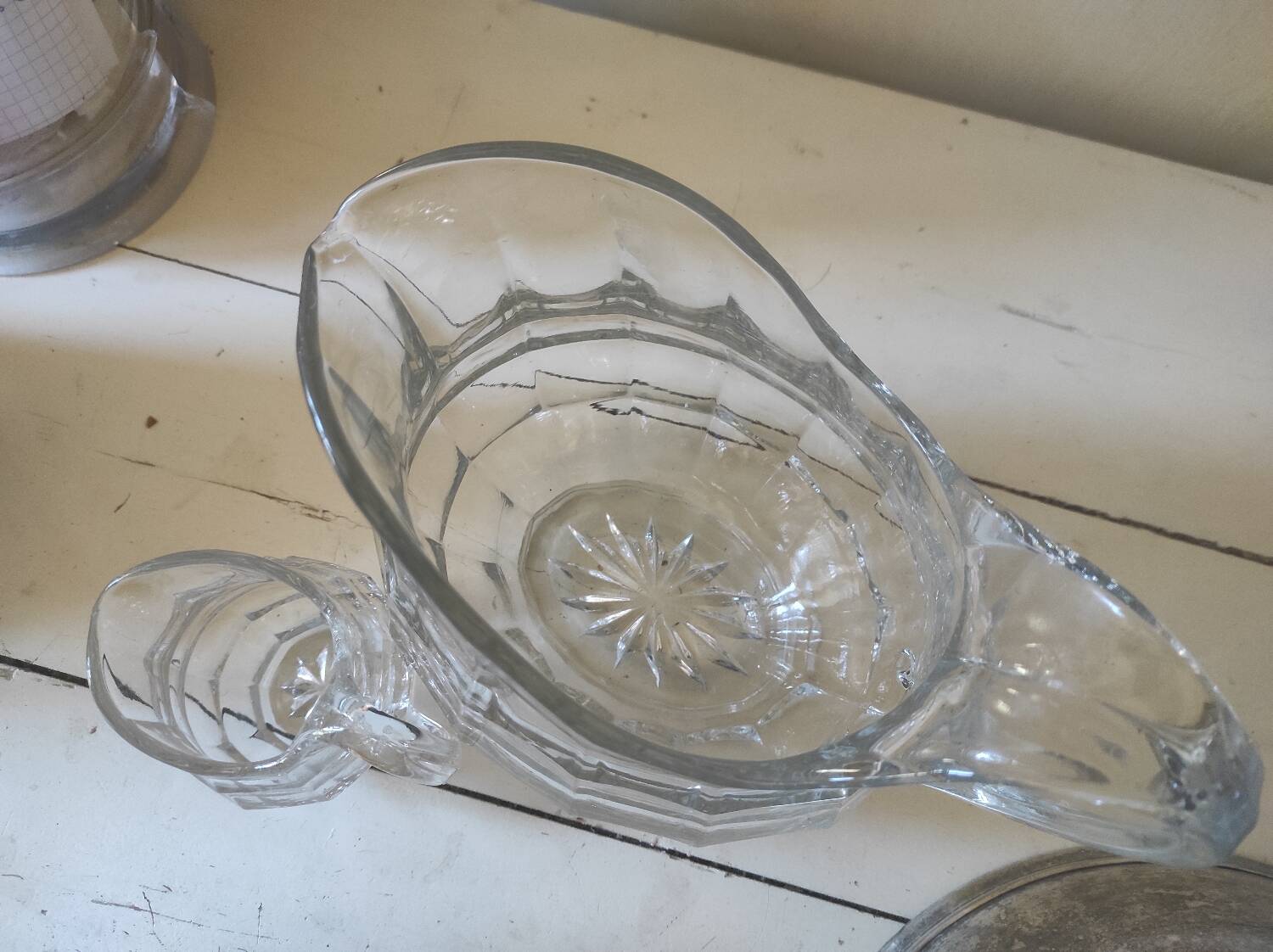 2 antique glass pitchers