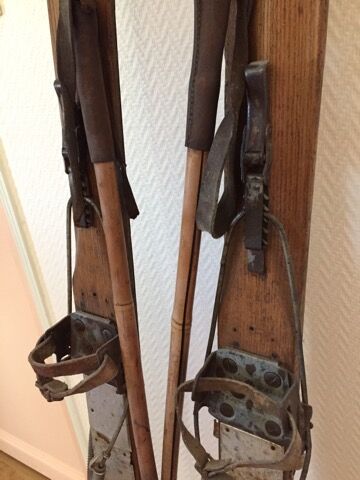 Wooden skis and vintage bamboo sticks