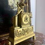 Period clock restoration in gilded bronze