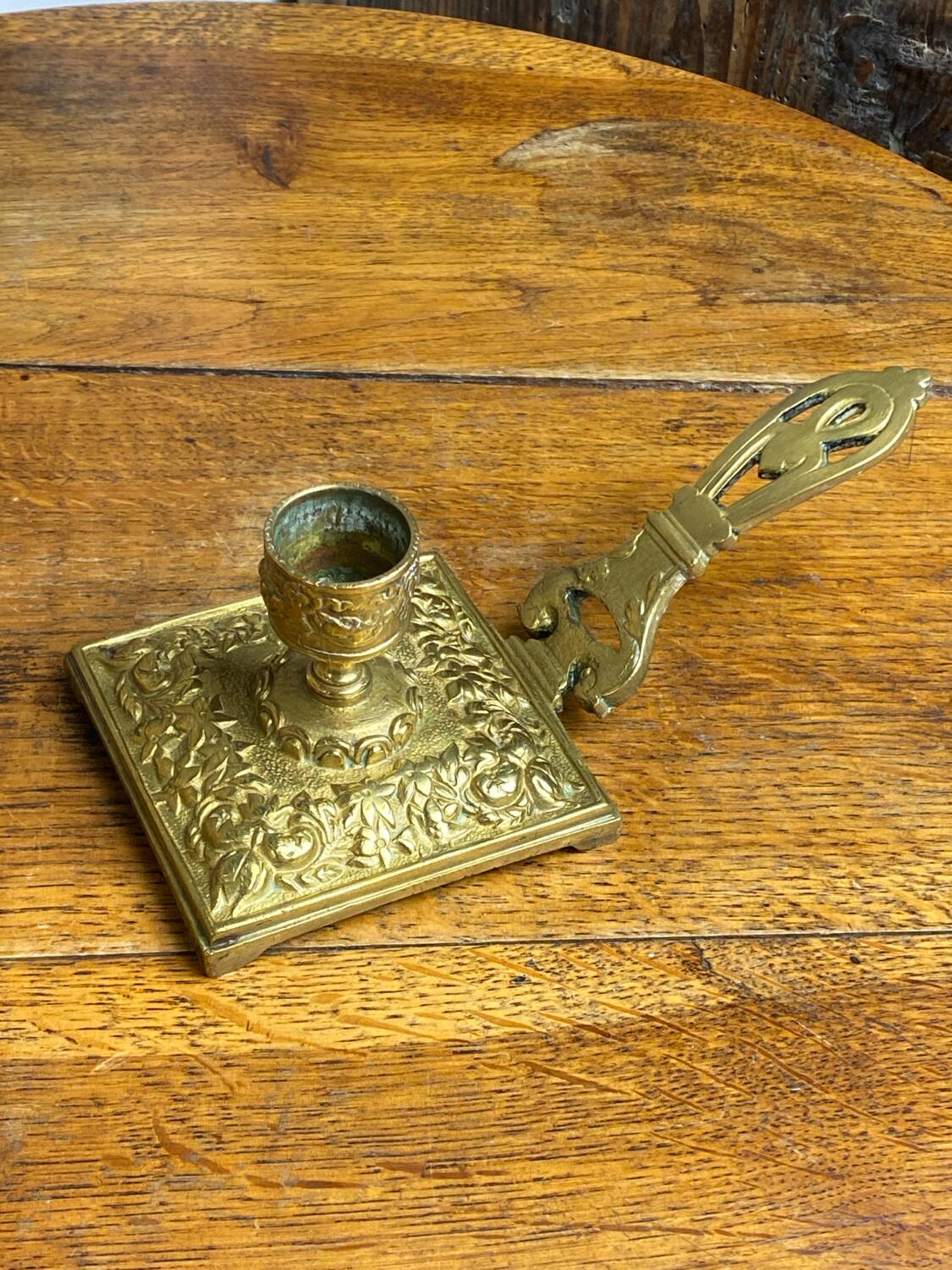 Bronze hand candlestick
