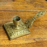 Bronze hand candlestick