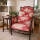 Antique armchair from around 1900, solid wood – red toile de Jouy.
