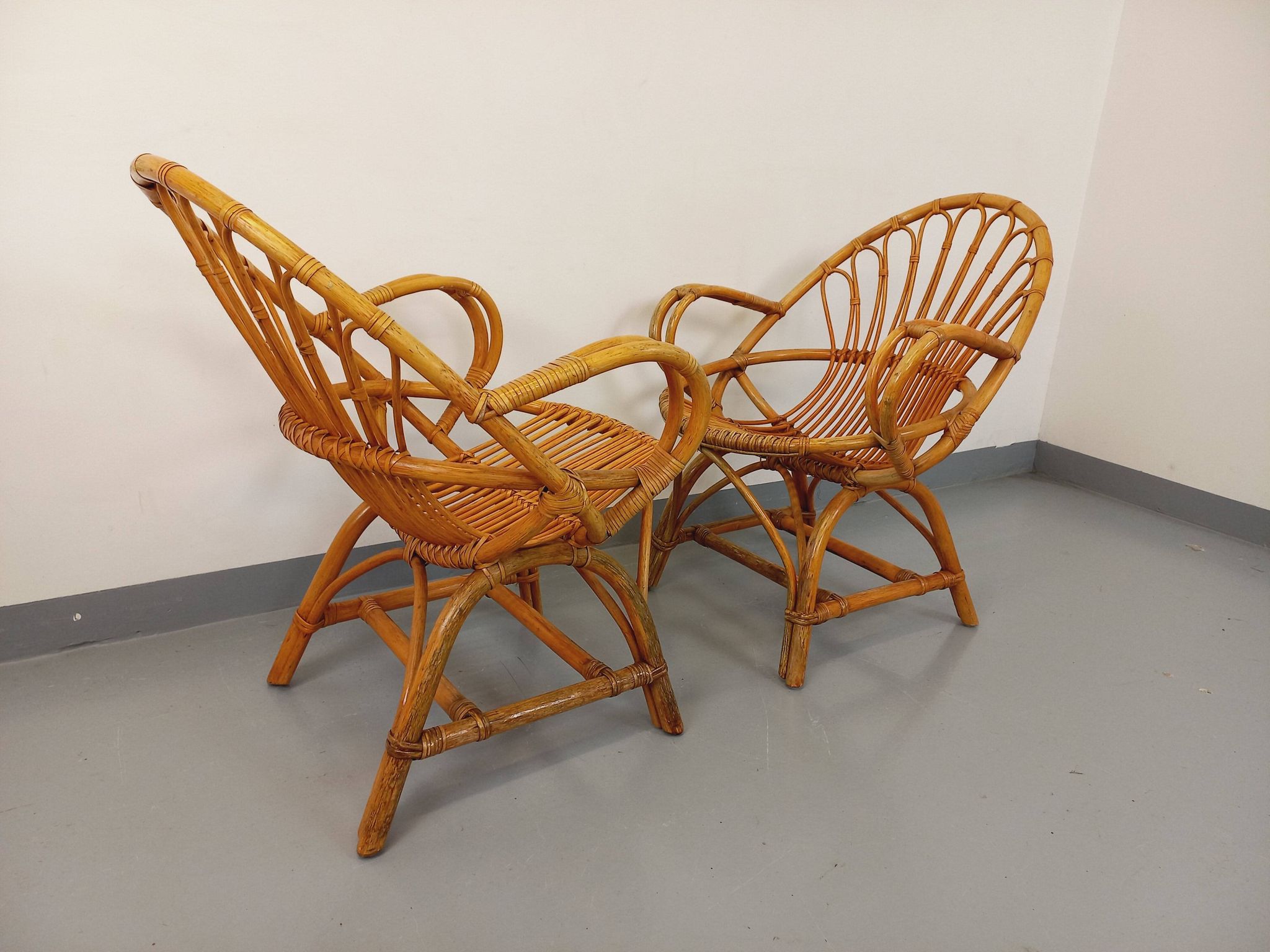 Pair of vintage rattan armchairs from the 60s