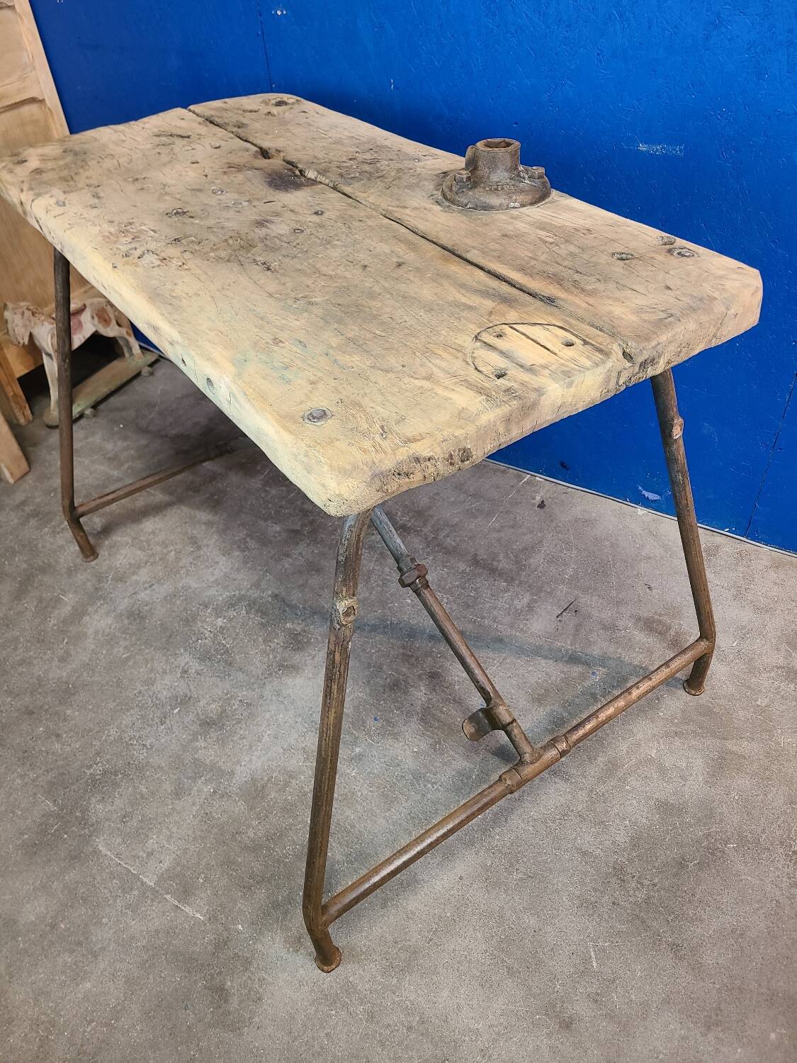 Vintage workbench circa 1930, folding metal leg.