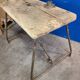 Vintage workbench circa 1930, folding metal leg.
