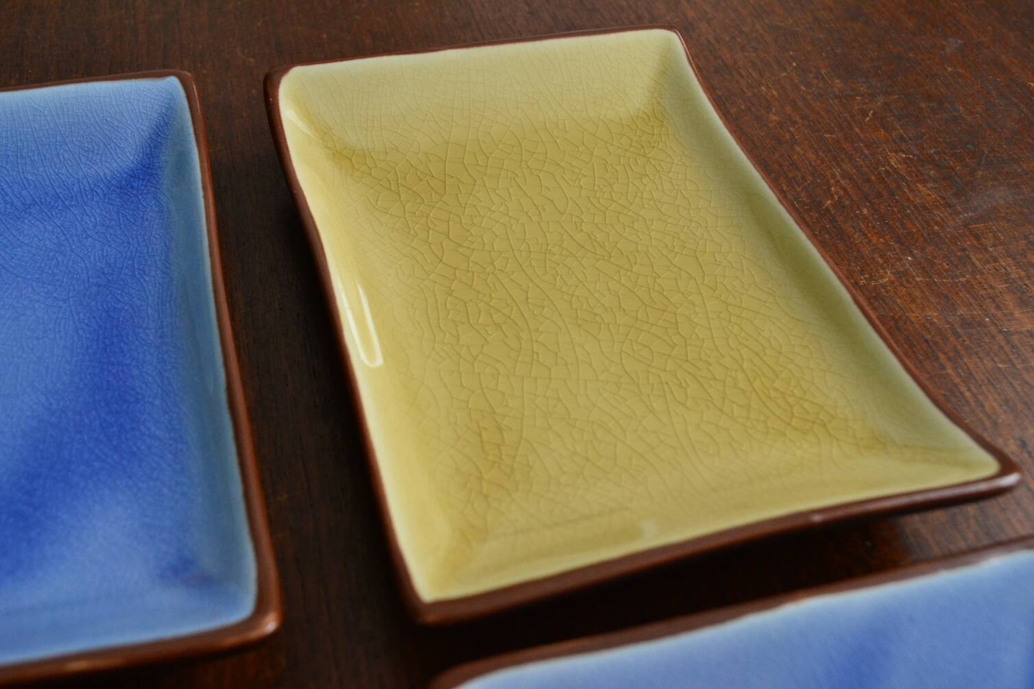 4 rectangular enameled ceramic cups