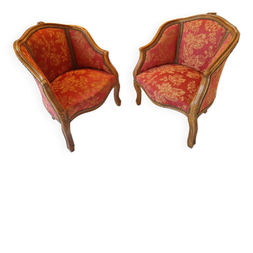 Pair of louis xv cabriolet armchairs with sculpted wood and pink & red floral fabric