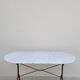 Restaurant bistro table in oval marble and decorated cast iron bases -1m51