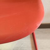 Red muuto "visu" chairs with sled base