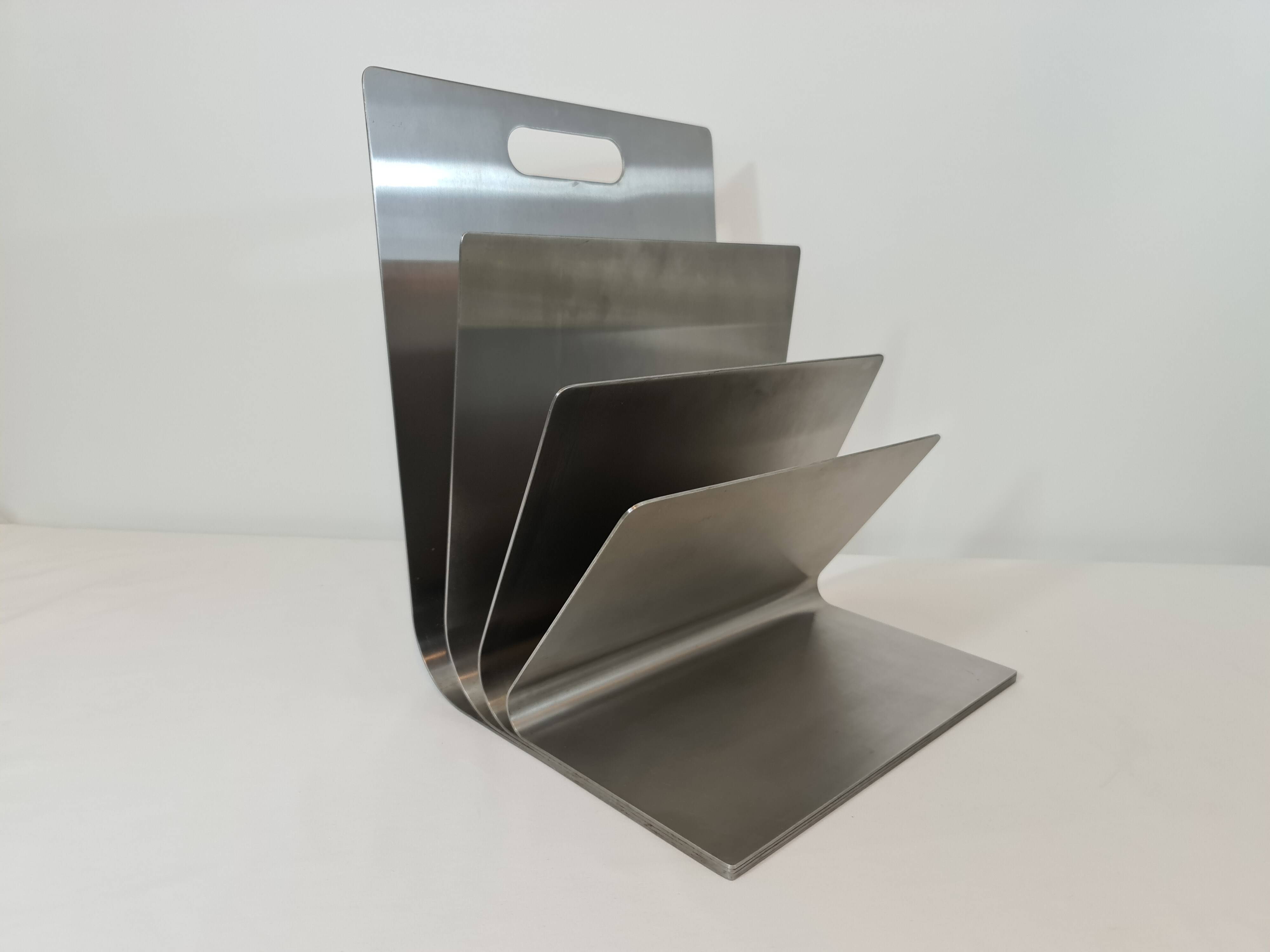 Stainless steel magazine rack by Xavier Féal for Inox Industrie 1970s