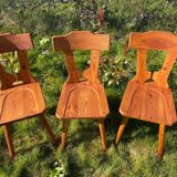 Three solid wood chairs