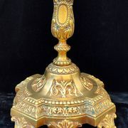 Pair of antique carved bronze candlesticks.